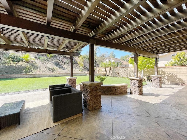 view of patio / terrace featuring a fenced backyard and a pergola