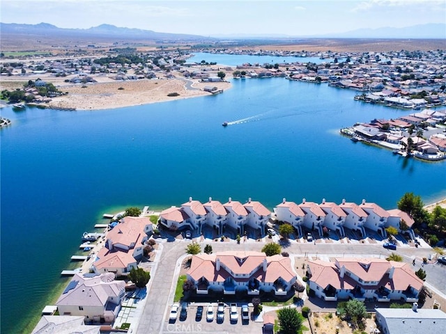 aerial view with a water view and a residential view