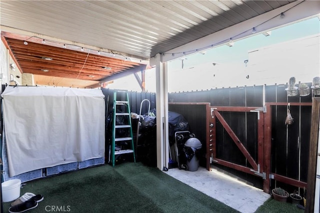 view of patio / terrace featuring fence