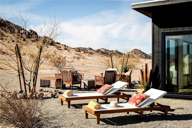 view of patio / terrace with a mountain view