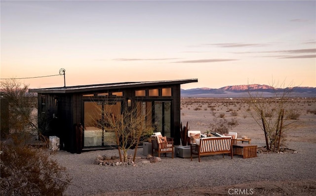 exterior space featuring a mountain view