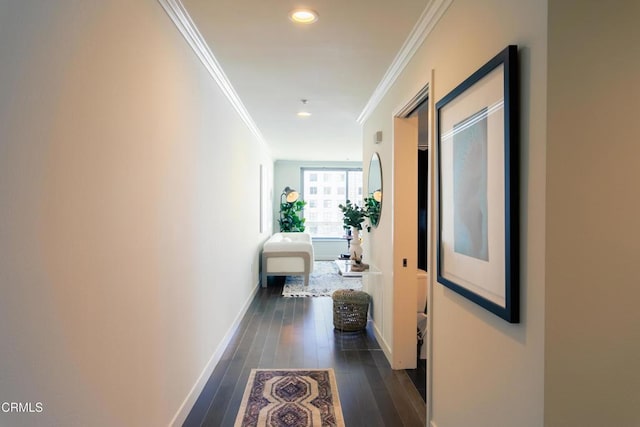 hall featuring ornamental molding, recessed lighting, dark wood-type flooring, and baseboards