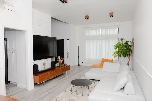 living room with light wood-style floors