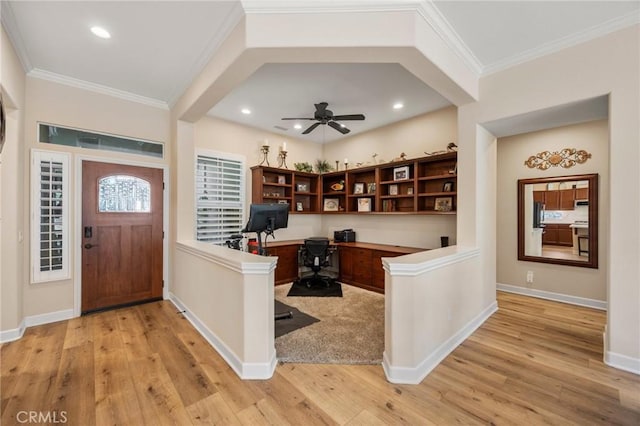 home office featuring baseboards, ceiling fan, crown molding, light wood-type flooring, and recessed lighting