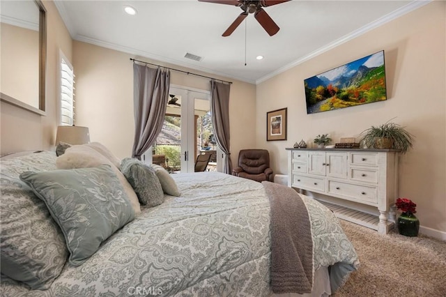 bedroom featuring access to outside, visible vents, crown molding, and carpet