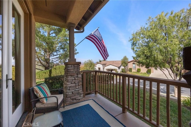 balcony featuring covered porch