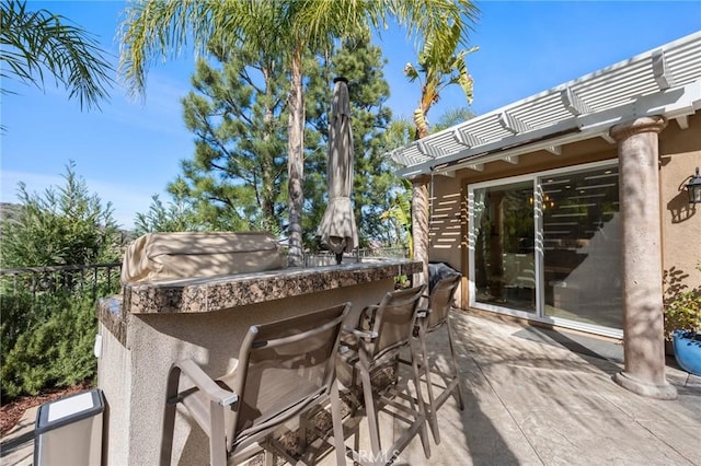 exterior space featuring outdoor dry bar