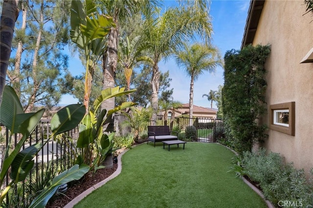 view of yard featuring fence