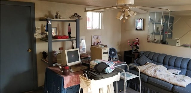 living room featuring ceiling fan