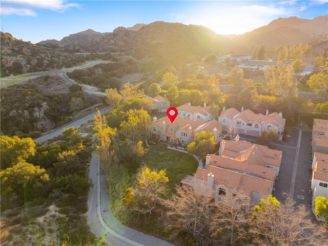 bird's eye view with a residential view and a mountain view