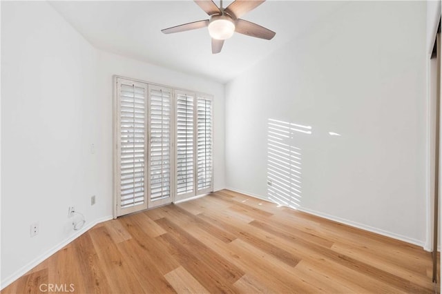 unfurnished bedroom with a ceiling fan, light wood-type flooring, access to outside, and baseboards