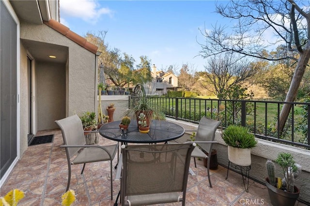 view of patio / terrace featuring a balcony