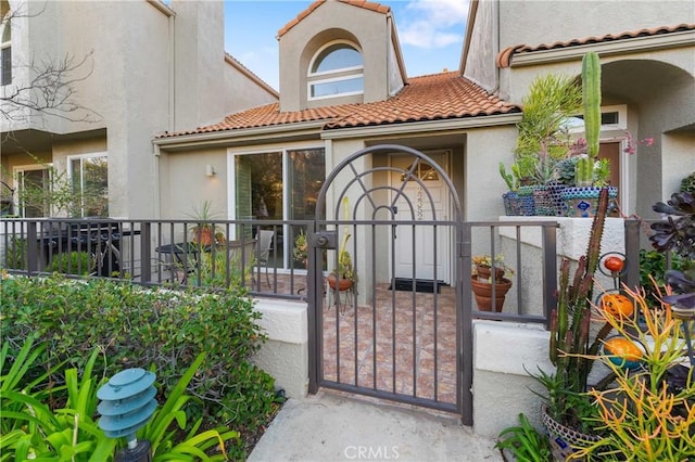 view of gate featuring a fenced front yard