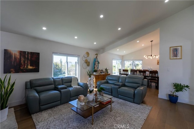 living room with baseboards, plenty of natural light, hardwood / wood-style flooring, and recessed lighting