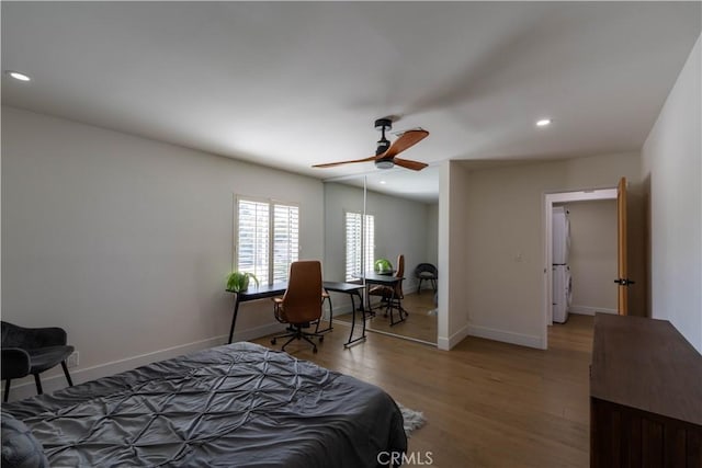 bedroom with ceiling fan, baseboards, wood finished floors, and recessed lighting