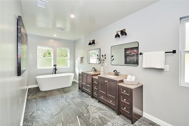 5386 Harter Ln, La Canada Flintridge, CA 91011 - bathroom with baseboards, a soaking tub, two vanities, marble finish flooring, and recessed lighting