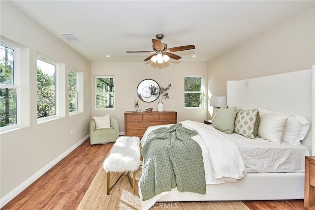 5386 Harter Ln, La Canada Flintridge, CA 91011 - bedroom featuring multiple windows, wood finished floors, baseboards, a ceiling fan, and recessed lighting