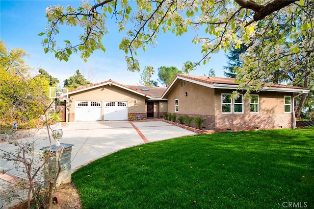 ranch-style house featuring stucco siding, a front yard, crawl space, a garage, and driveway