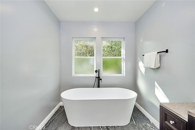 5386 Harter Ln, La Canada Flintridge, CA 91011 - full bath with baseboards, marble look tiles, a freestanding tub, and recessed lighting