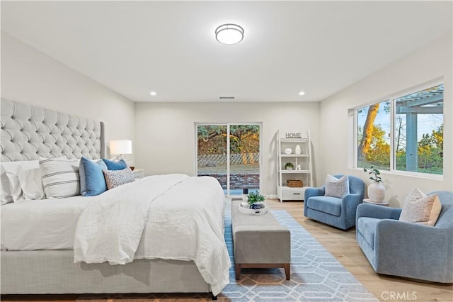 5386 Harter Ln, La Canada Flintridge, CA 91011 - bedroom with light wood-type flooring, multiple windows, recessed lighting, and access to exterior