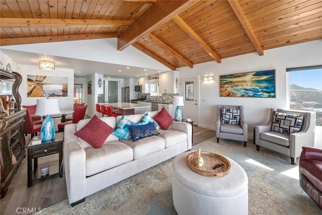 living area with wooden ceiling, high vaulted ceiling, beam ceiling, and wood finished floors