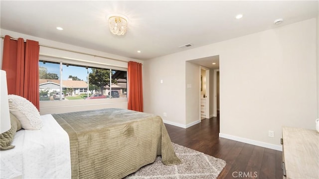 bedroom featuring dark wood-type flooring, recessed lighting, visible vents, and baseboards