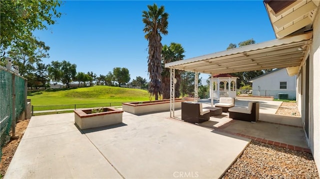 view of patio featuring cooling unit, an outdoor living space with a fire pit, fence, and a pergola