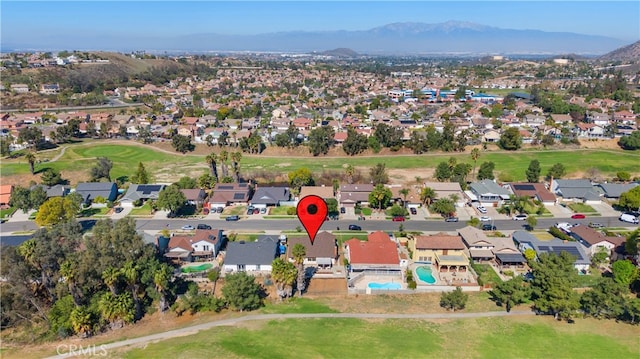 aerial view featuring a residential view and a mountain view