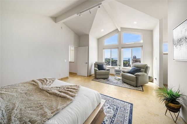 bedroom with high vaulted ceiling, beam ceiling, and track lighting