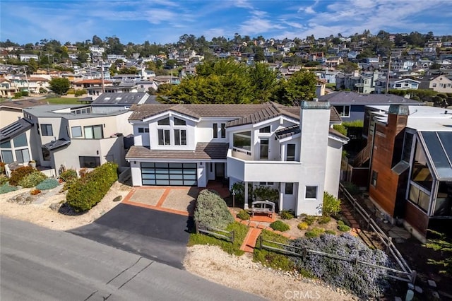 birds eye view of property with a residential view