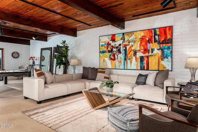 carpeted living area featuring brick wall, wood ceiling, and beam ceiling