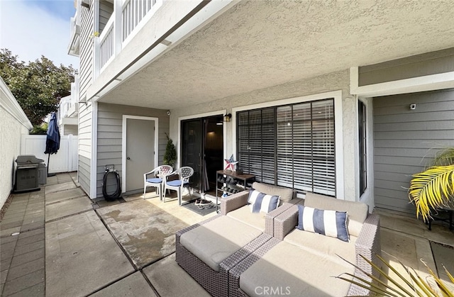 view of patio / terrace with fence and cooling unit