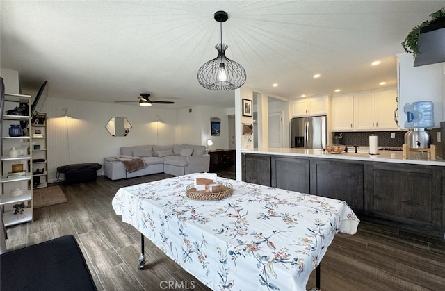 dining room featuring a ceiling fan, recessed lighting, and dark wood-style flooring