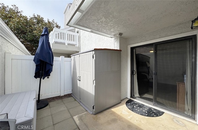 view of patio with fence