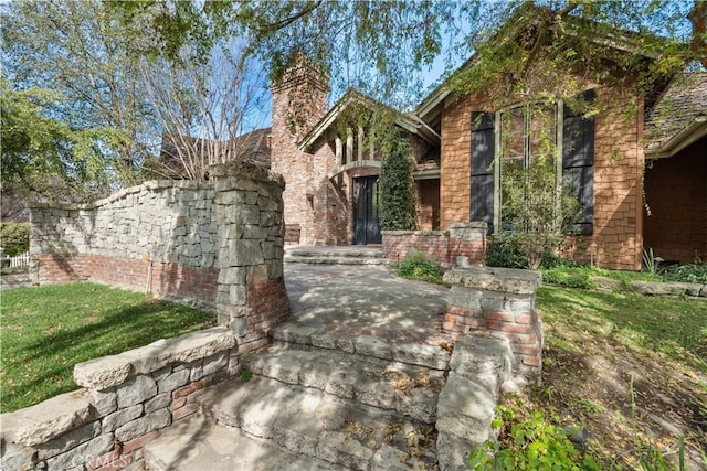 view of front of property with a chimney