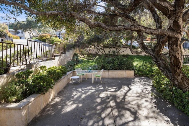 view of patio / terrace with outdoor dining area and fence private yard