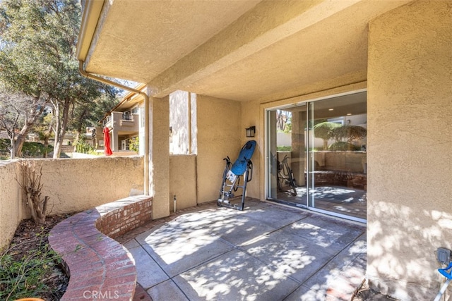 view of patio featuring fence