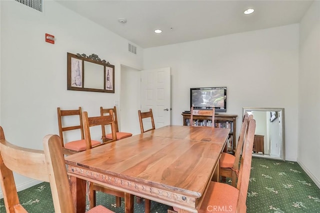 carpeted dining room with visible vents and recessed lighting