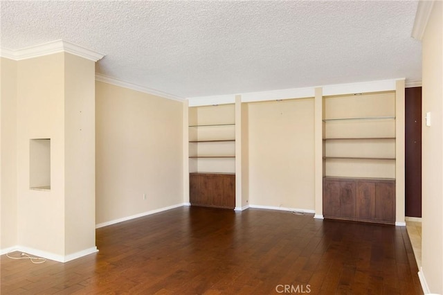 32709 Seagate Dr Unit 108, Rancho Palos Verdes, CA 90275 - unfurnished room featuring a textured ceiling, baseboards, ornamental molding, built in shelves, and hardwood / wood-style flooring