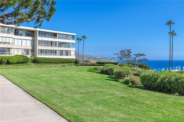 32709 Seagate Dr Unit 108, Rancho Palos Verdes, CA 90275 - view of property's community featuring a yard and a water view