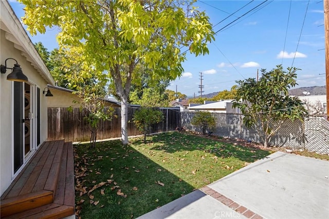 view of yard featuring a fenced backyard