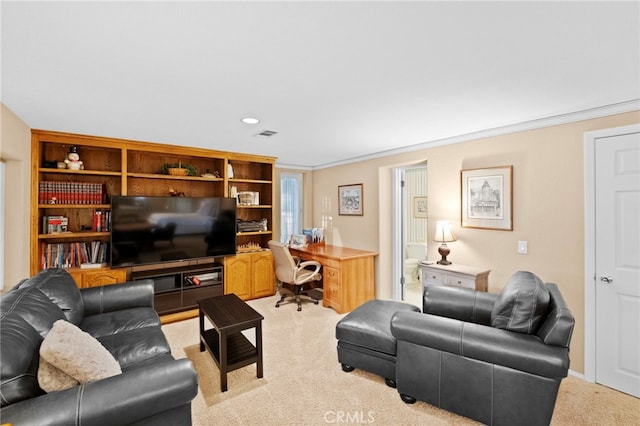 living area with visible vents, crown molding, and light colored carpet