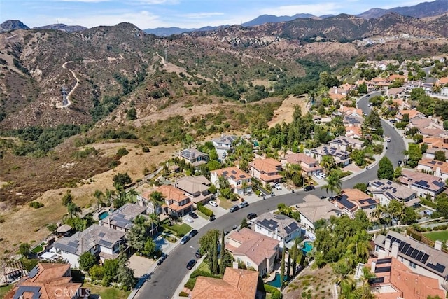 aerial view featuring a residential view and a mountain view