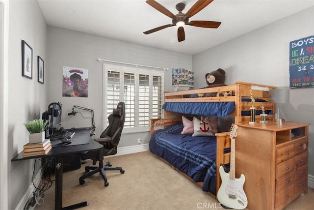 bedroom with light carpet, ceiling fan, and baseboards