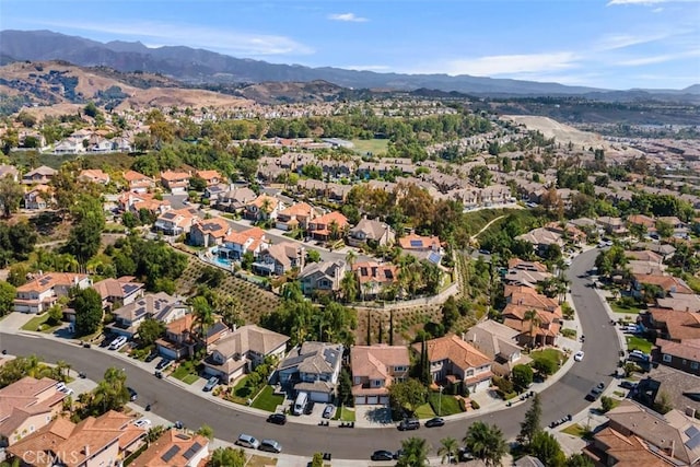 birds eye view of property featuring a residential view and a mountain view