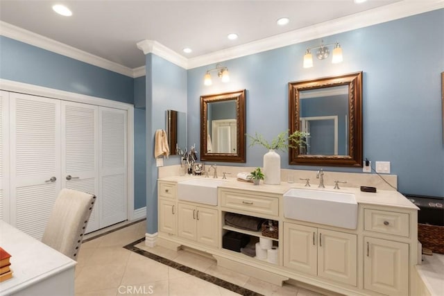 bathroom featuring a sink, double vanity, a closet, and recessed lighting