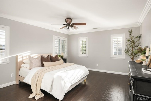 bedroom with dark wood finished floors, visible vents, and baseboards