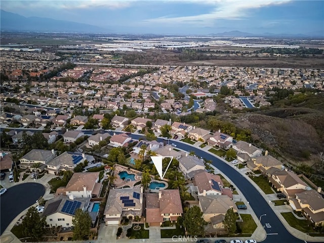 aerial view with a mountain view and a residential view