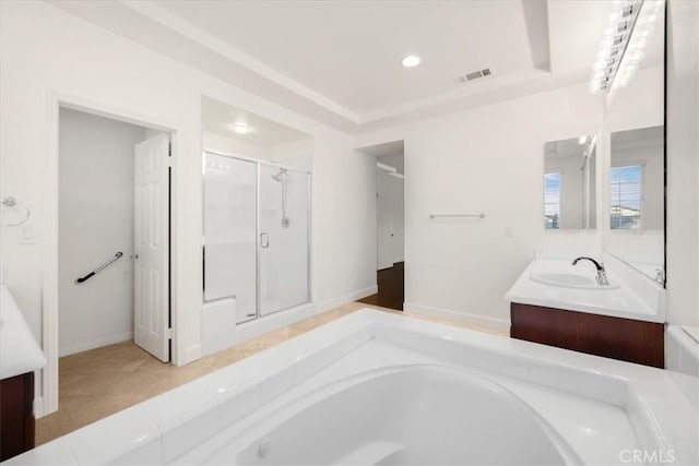 bathroom with a garden tub, recessed lighting, visible vents, a stall shower, and vanity