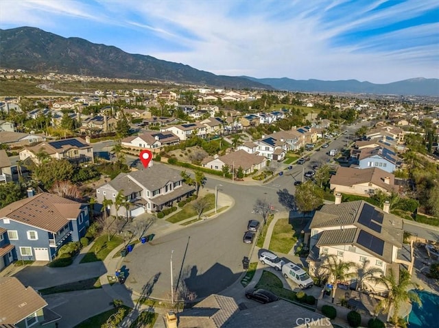 birds eye view of property featuring a residential view and a mountain view